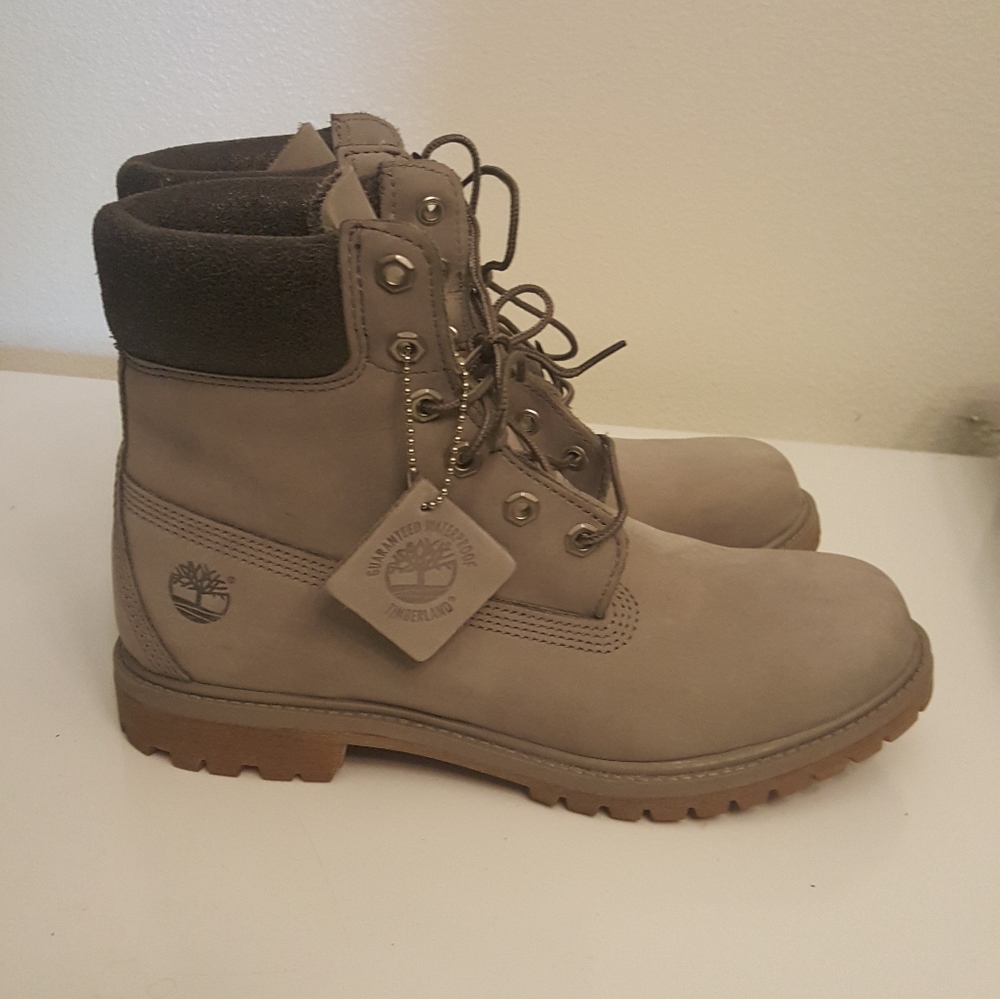 Dark grey and black Timberlands